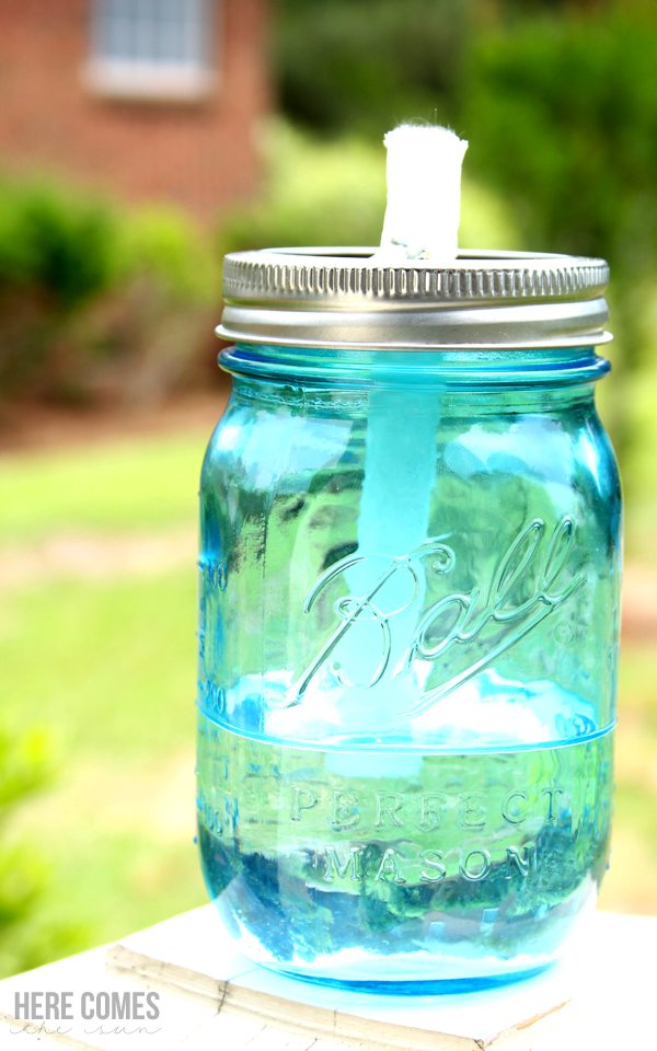 Create these mason jar citronella candles and keep the bugs away!